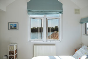 Bedroom 1 lake view- click for photo gallery